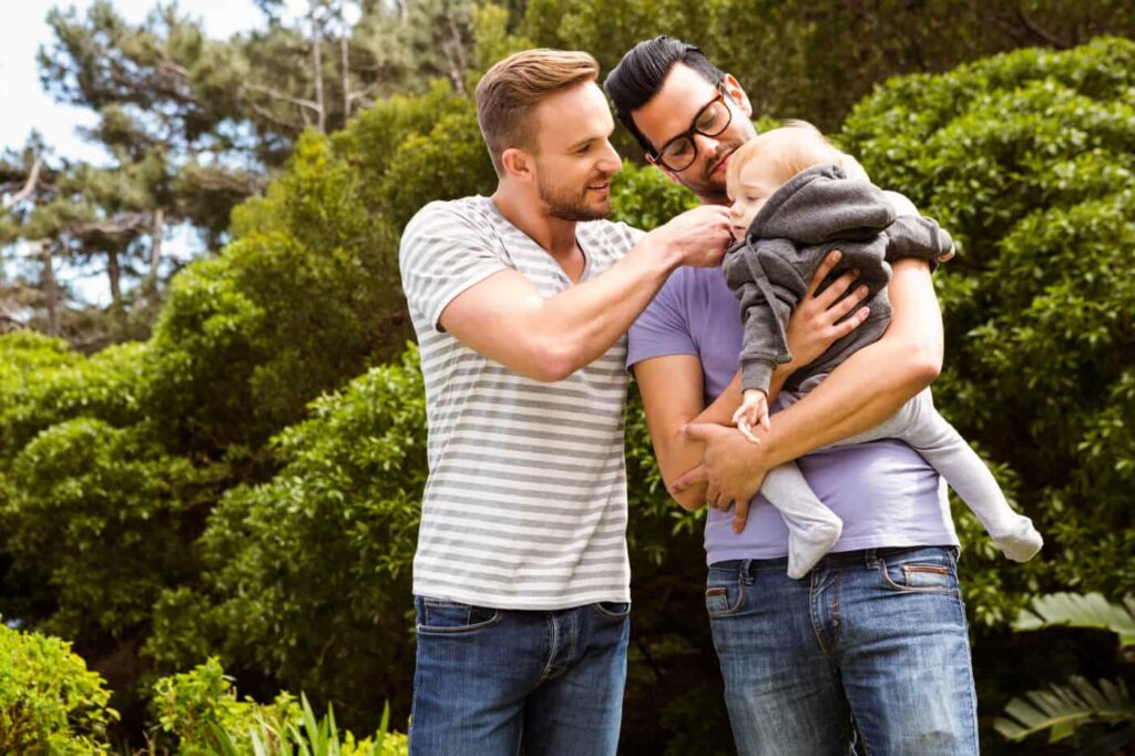 Same-sex male couple with child