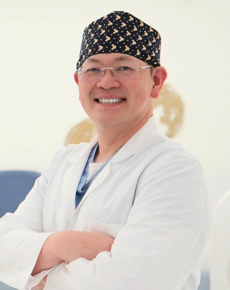 founder of RFC, male Asian doctor smiling